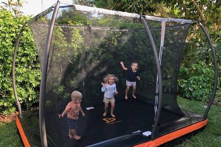 In-ground-rectangular-trampoline-kids-gettrampoline.com