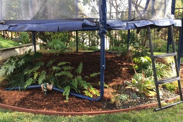 What to Put under a Trampoline