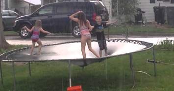 Jumping-on-trampoline-in-the-rain