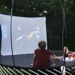 Setting up a Movie Theater on the Trampoline