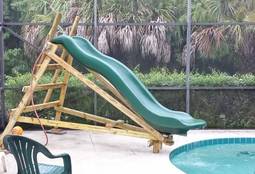 Using-a-Playground-Slide-For-a-Pool